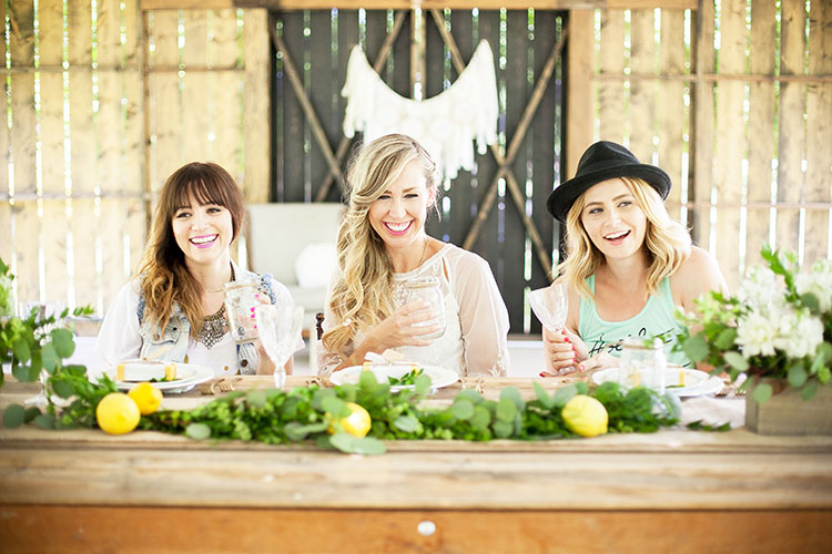 a long farm table for baby shower guests | the love designed life