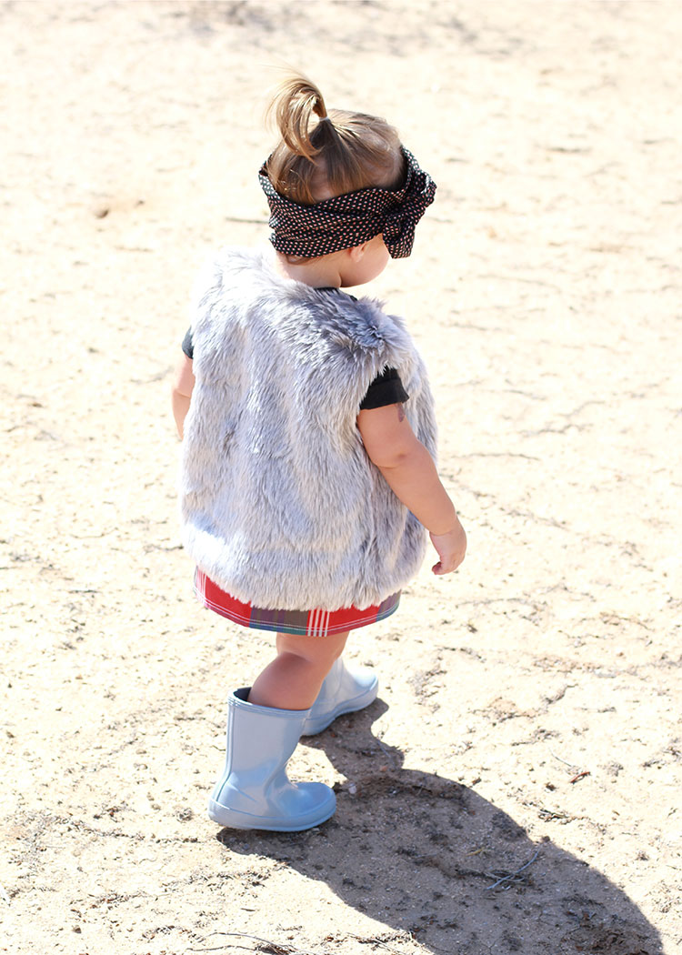 fur vest and rain boots say fall in the desert | | the love designed life