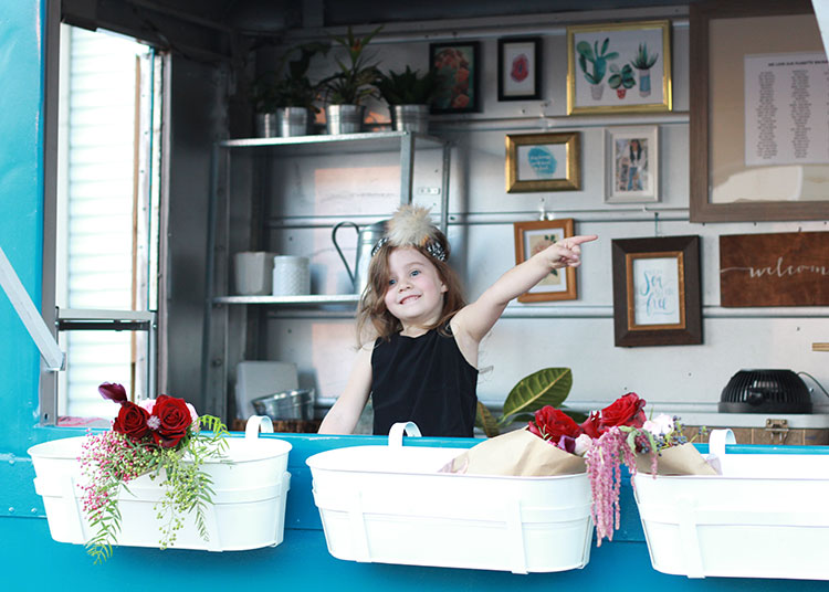 i'd buy flowers from this cutie any day | the love designed life