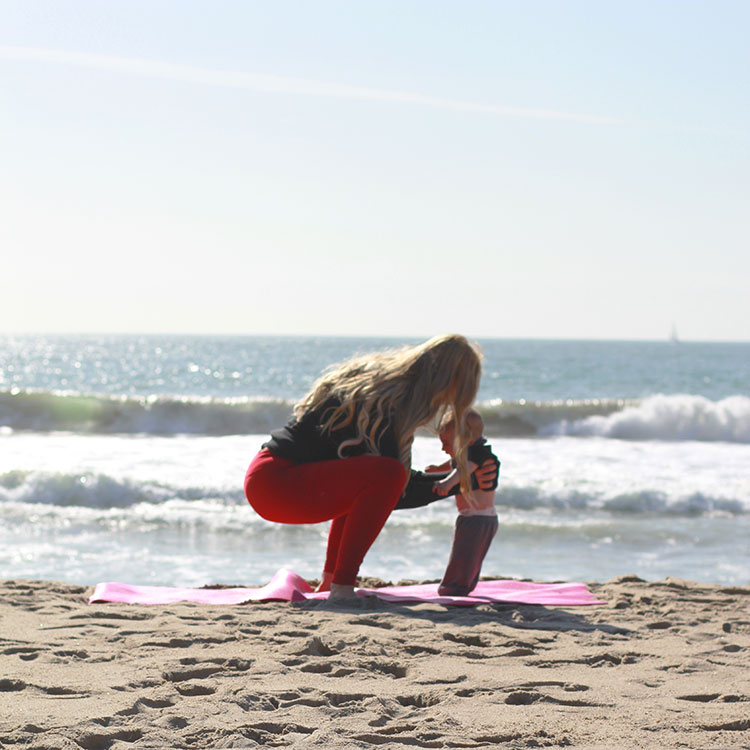 squats with baby | m and m pilates on the beach | the love designed life
