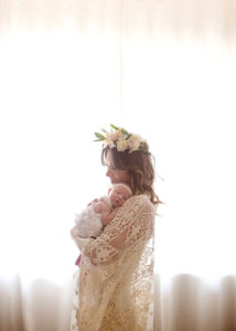 love this sweet silhouette of boho mama and her newborn babe by the window | the love designed life