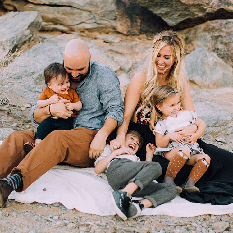 tickle fight | boho desert family photo session | thelovedesignedlife.com