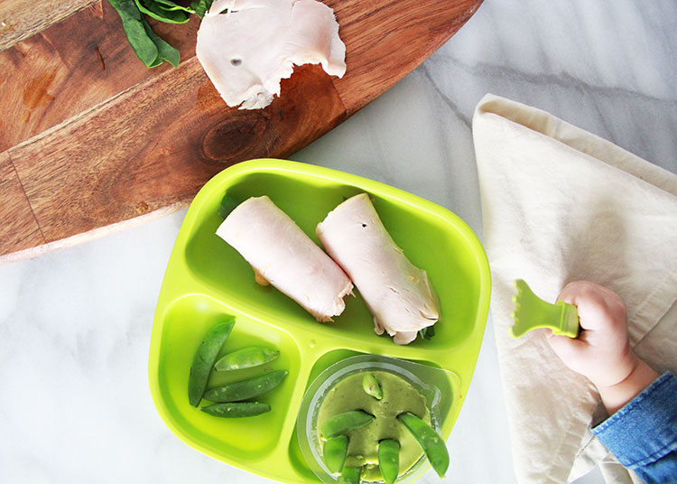 toddler lunch! turkey rollups with hummus + spinach, guacamole, and snap peas | thelovedesignedlife.com