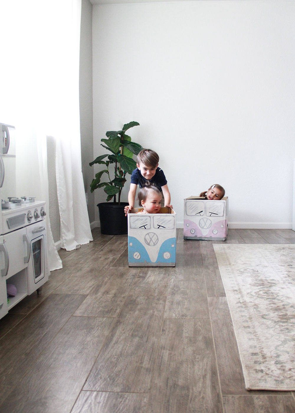 and they're off! love these little vw bus box cars from cardboard | thelovedesignedlife.com