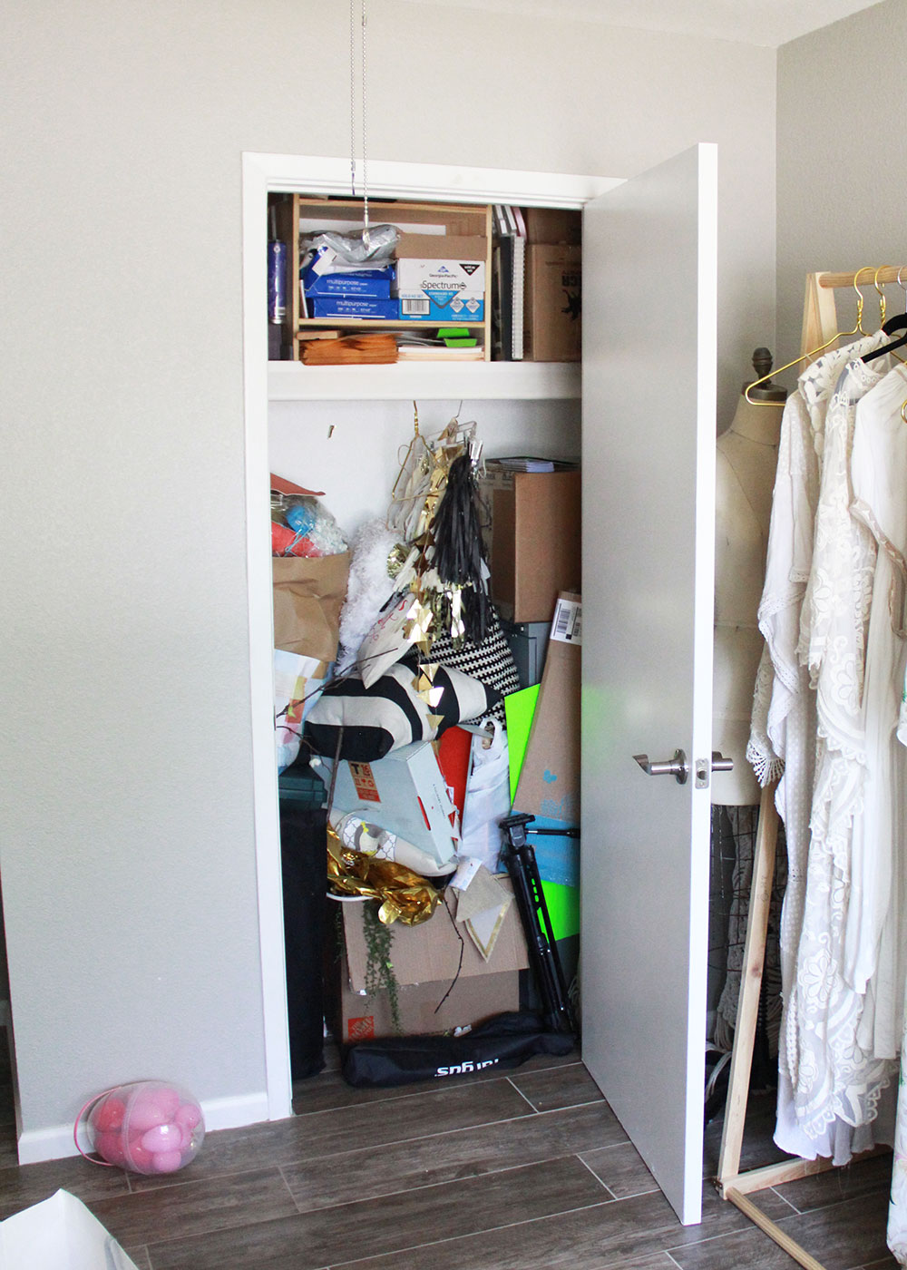 our embarrassingly messy spare closet: before spring cleaning