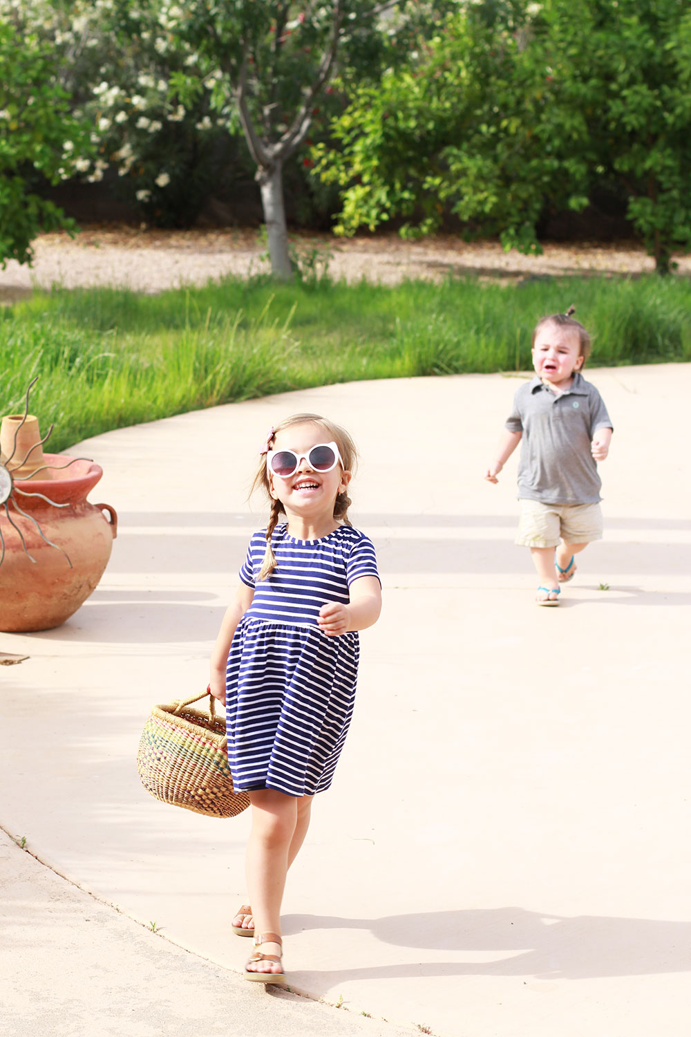 she's so happy to be torturing her brother. | thelovedesignedlife.com