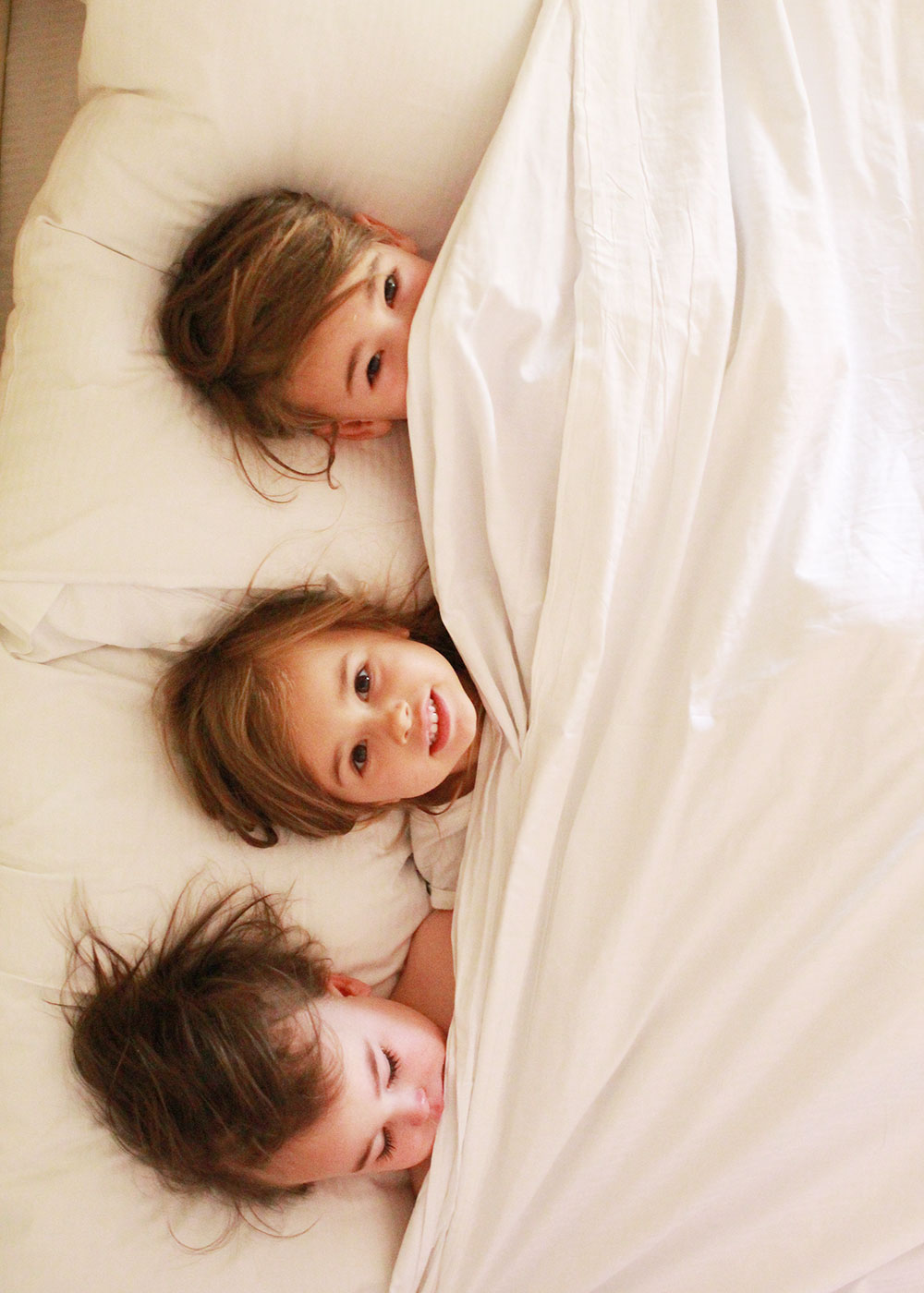 three little monkeys in the point hilton squaw peak resort bed! | thelovedesignedlife.com