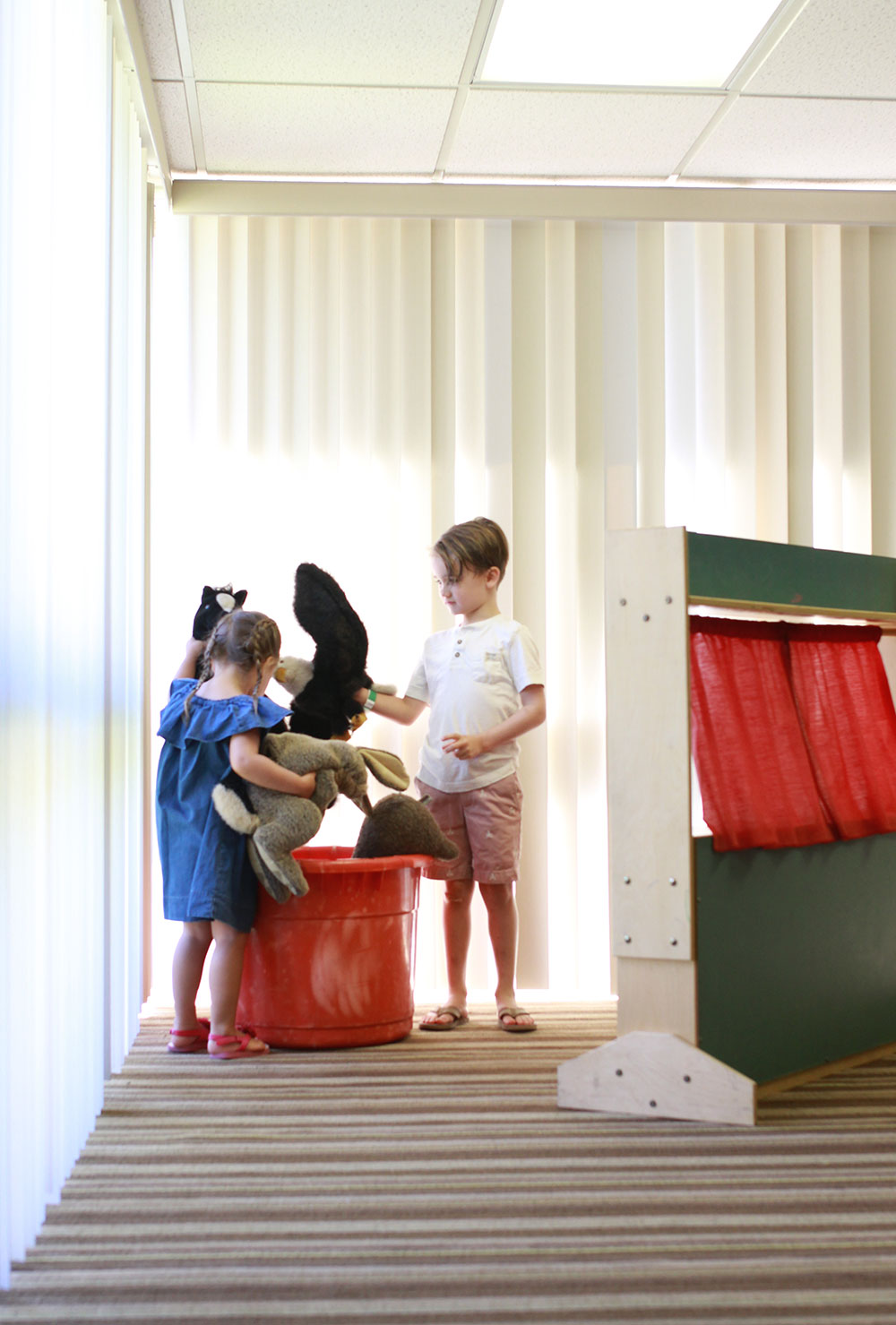 setting up for a puppet show in the coyote kids camp at the pointe hilton squaw peak resort | thelovedesignedlife.com