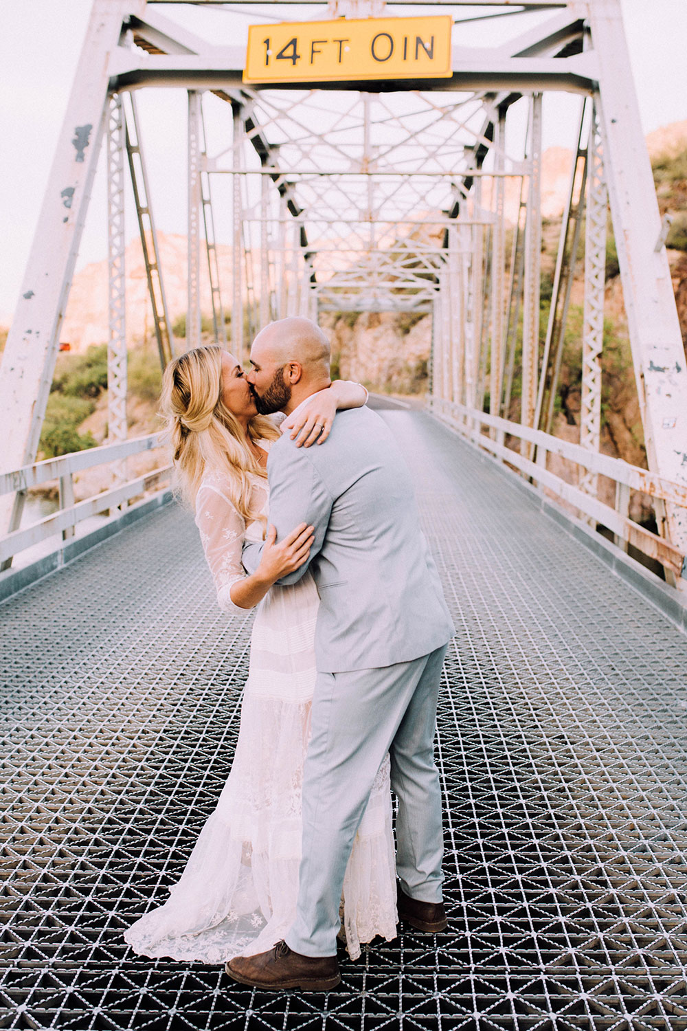 romantic boho wedding anniversary photos on a bridge | thelovedesignedlife.com