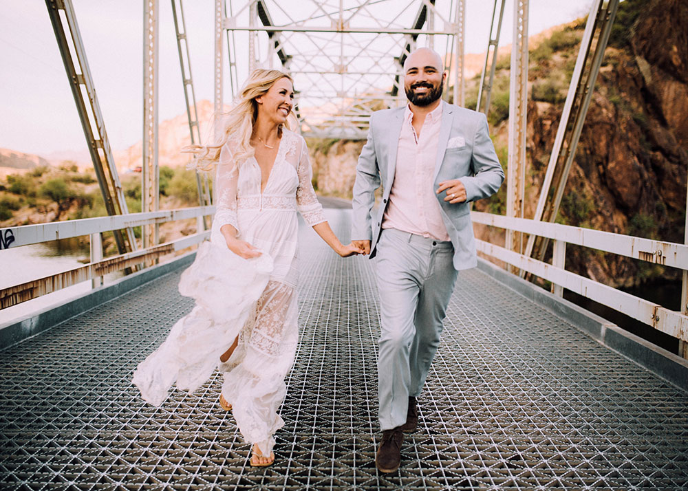 romantic boho wedding anniversary photos on a bridge | thelovedesignedlife.com