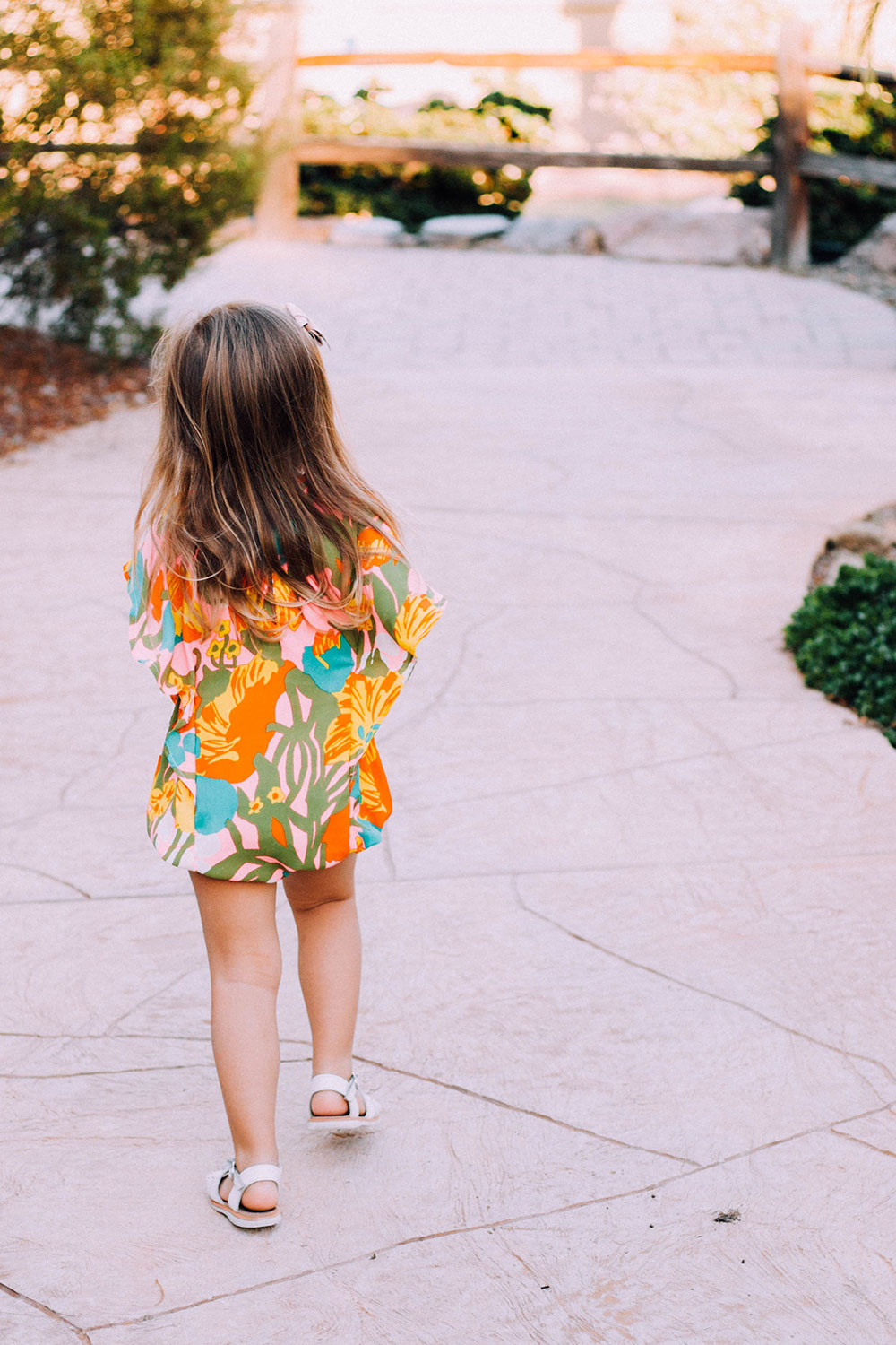 love this colorful flower print romper from children's clothing line crew and lu | sweetest mommy and me matching outfits by crew and lu | thelovedesignedlife.com