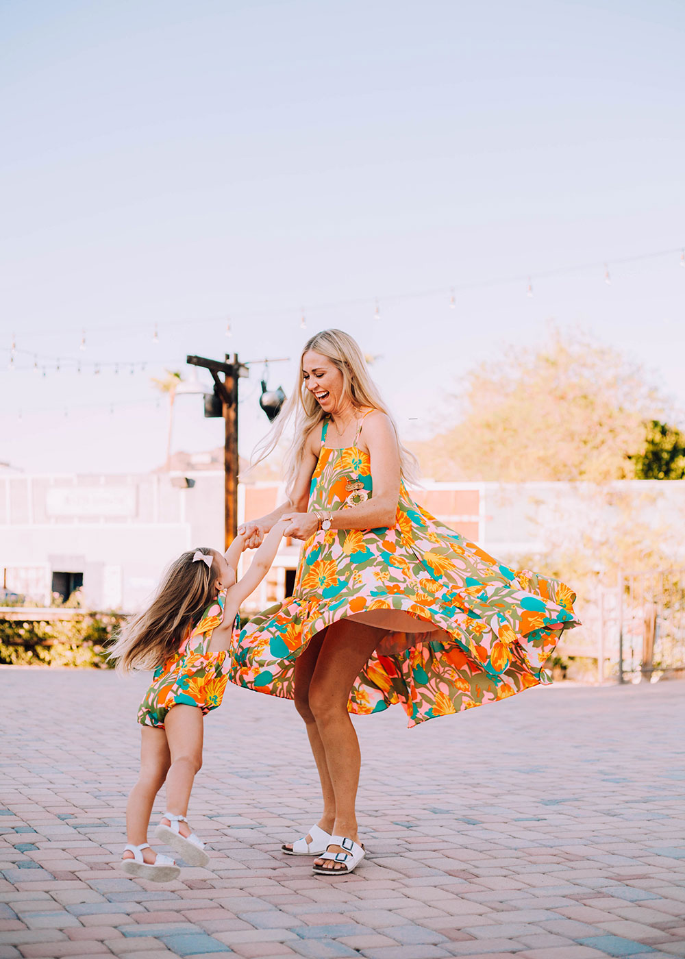 twirling with my sweet girl in our matching crew + lu outfits | thelovedesignedlife.com