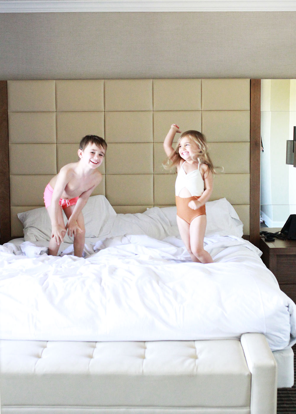monkeys jumping on the hotel bed | thelovedesignedlife.com