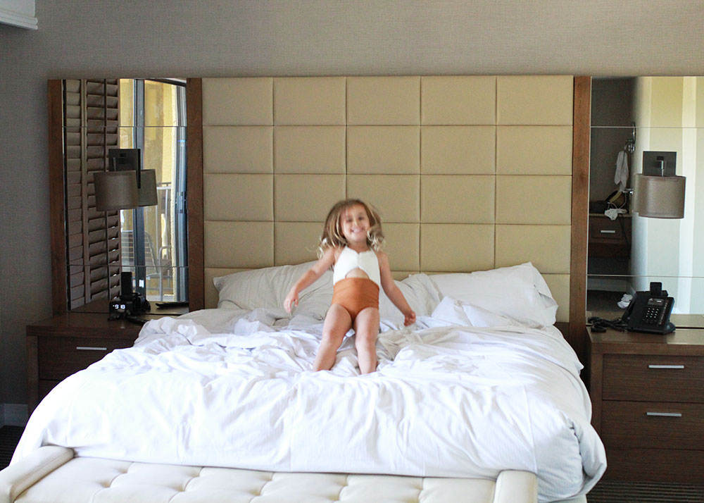 monkeys jumping on the hotel bed | thelovedesignedlife.com