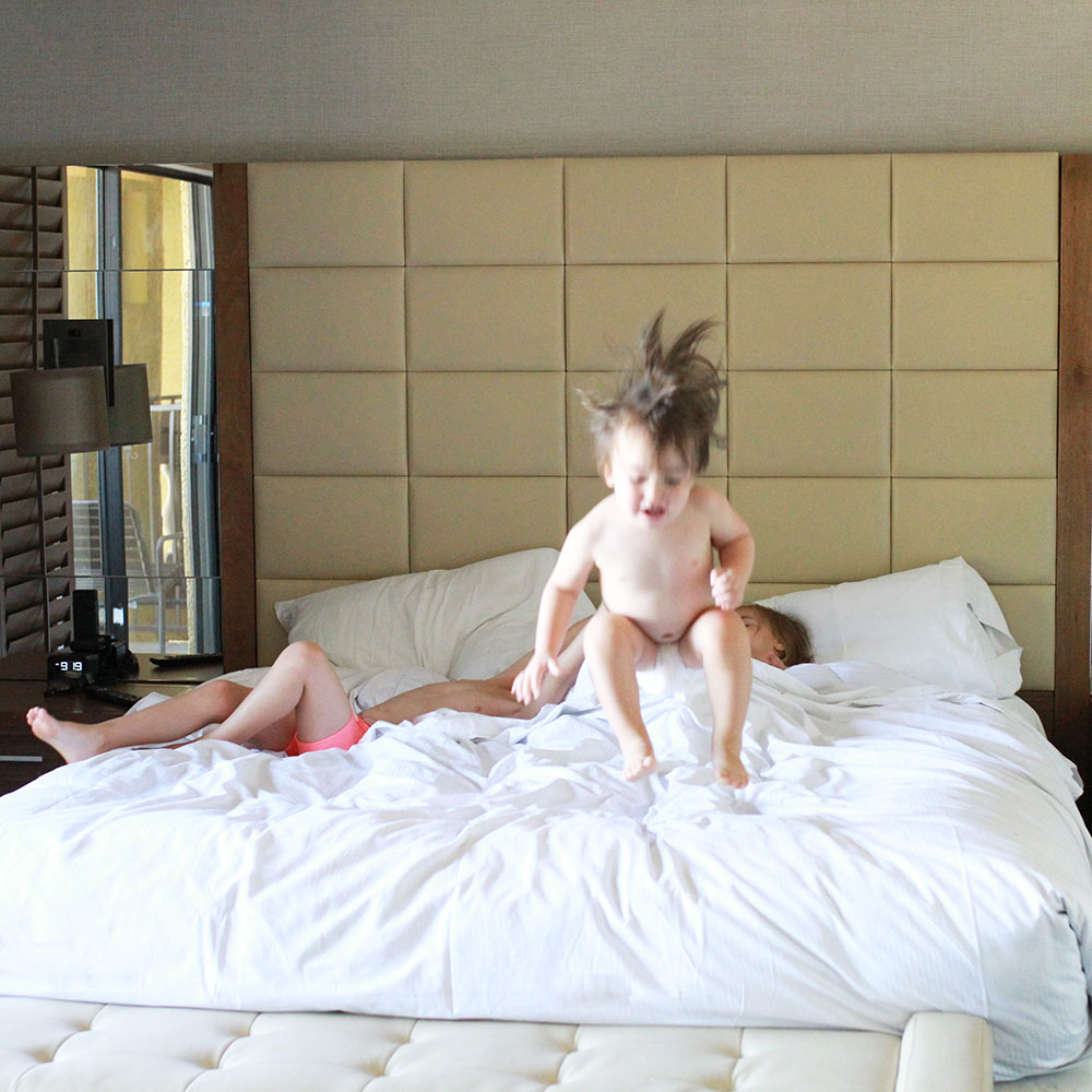 monkeys jumping on the hotel bed | thelovedesignedlife.com