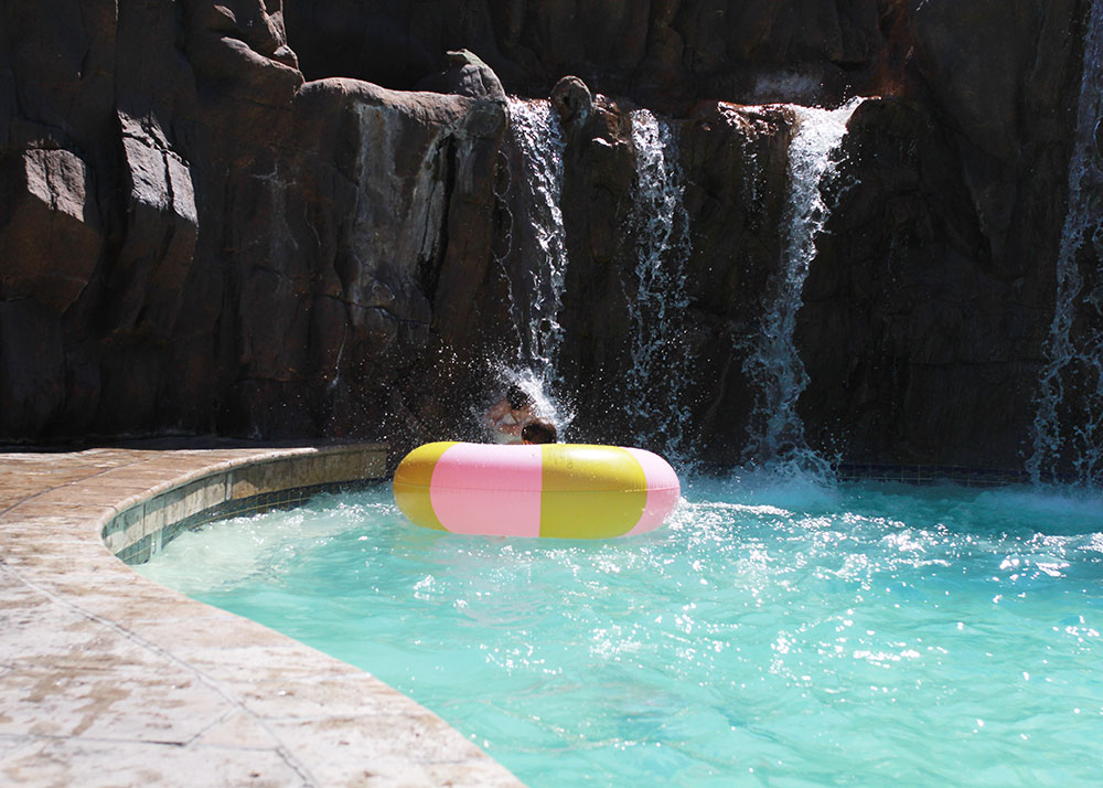 the kids loved this waterfall too and jumping into our float! | thelovedesignedlife.com