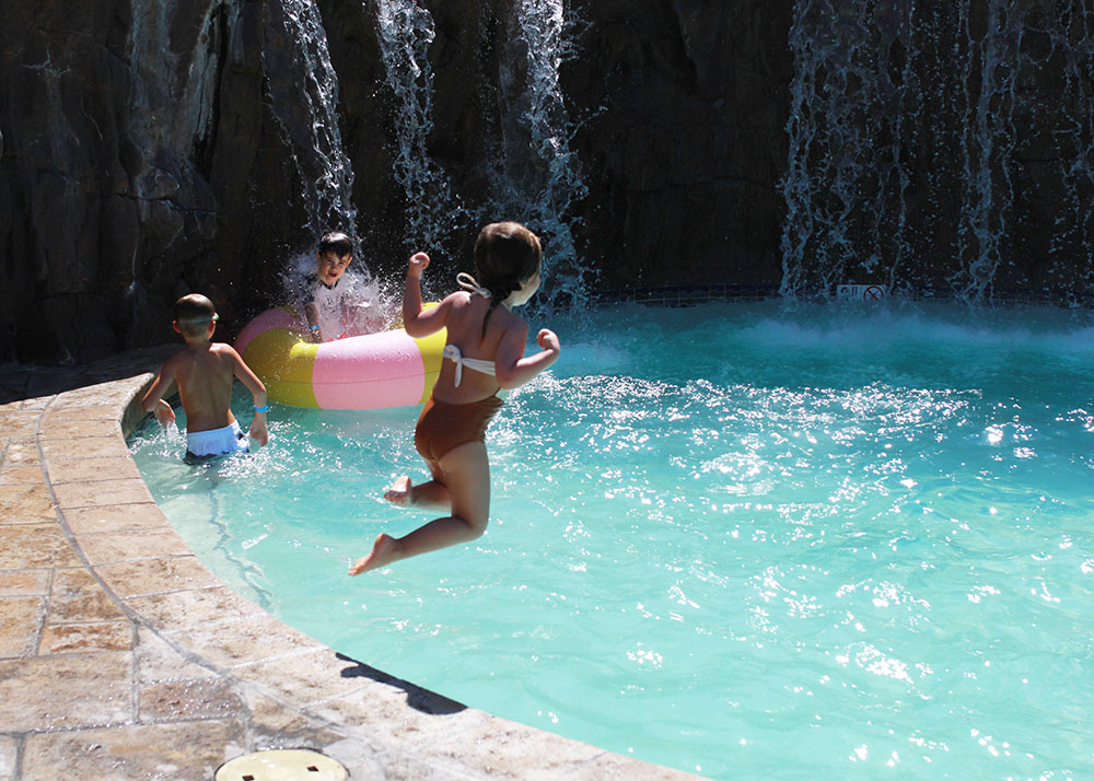 the kids loved this waterfall too and jumping into our float! | thelovedesignedlife.com