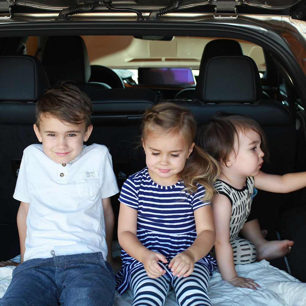 my three little ones checking out the back of this Lexus RX SUV we got to try out! | thelovedesignelife.com