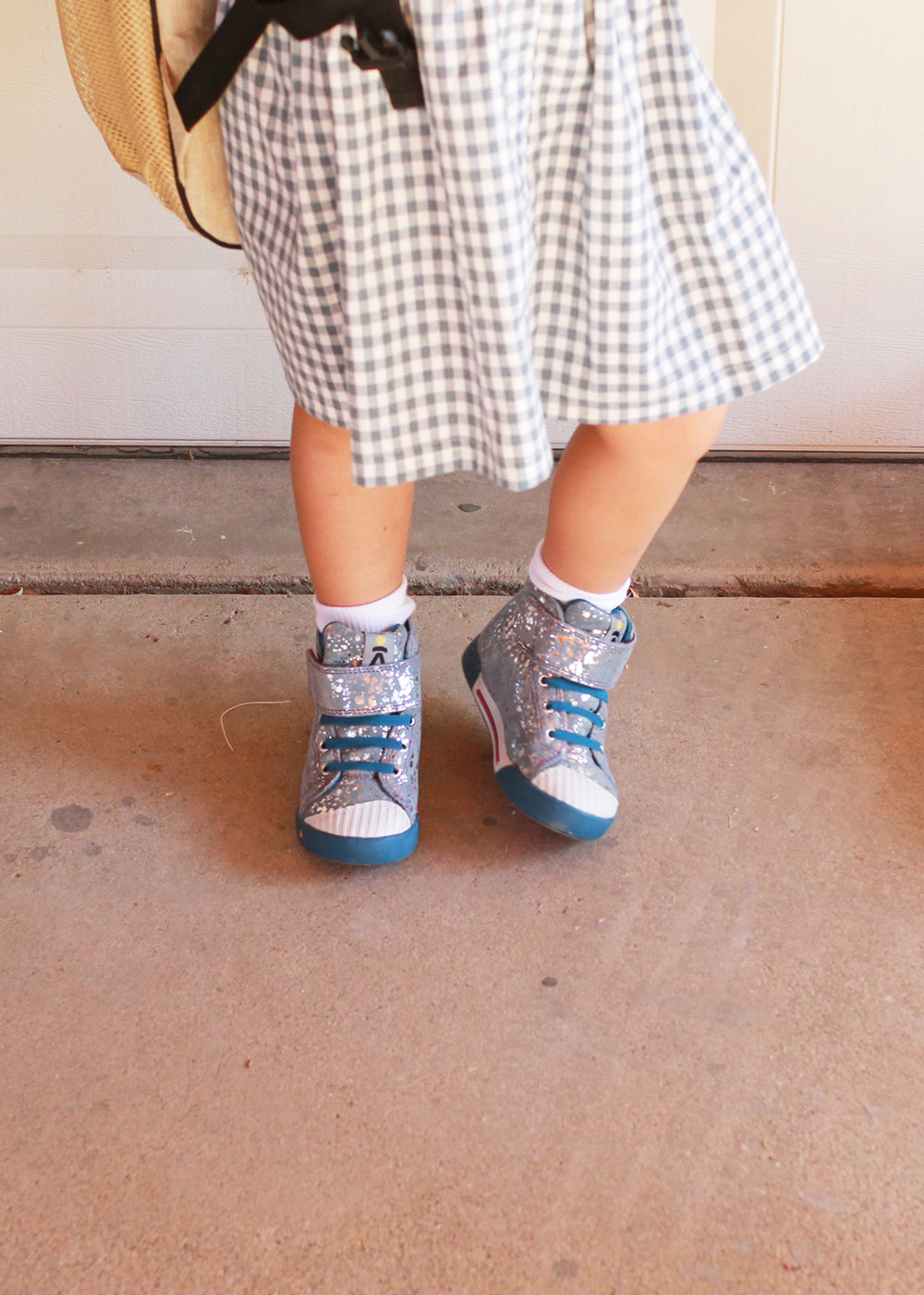 loving these little girl's silver foil print high top shoes. perfect for back to school! | thelovedesignedlife.com