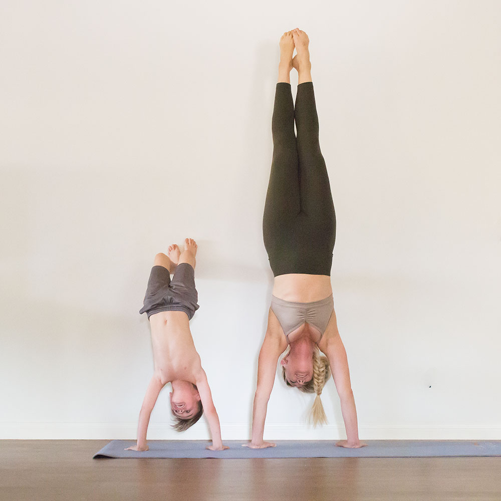 mother and son handstand practice at home. | thelovedesignedlife.com #forevermove #yoga