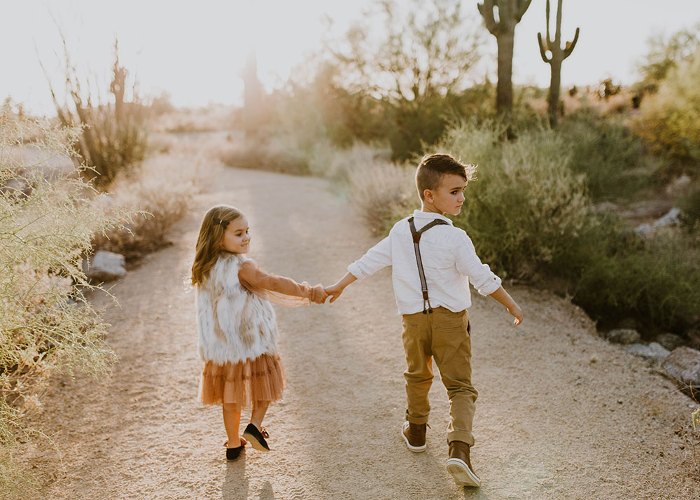 love this sibling shot in desert boho family photos #familyphotos #siblinglove | thelovedesignedlife.com