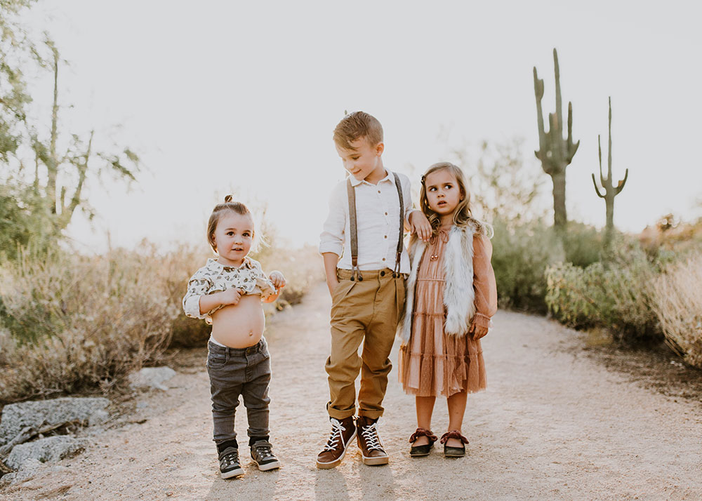 when your kids just that aren't into family photos. #desertfamilyphotos | thelovedesignedlife.com