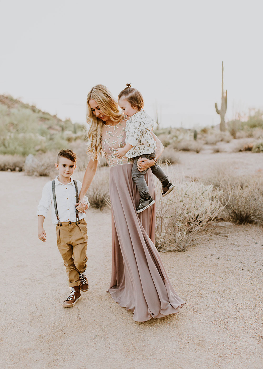 mama and her boys in this beautiful desert scene. #familyphotos #bohovibes | thelovedesignedlife.com