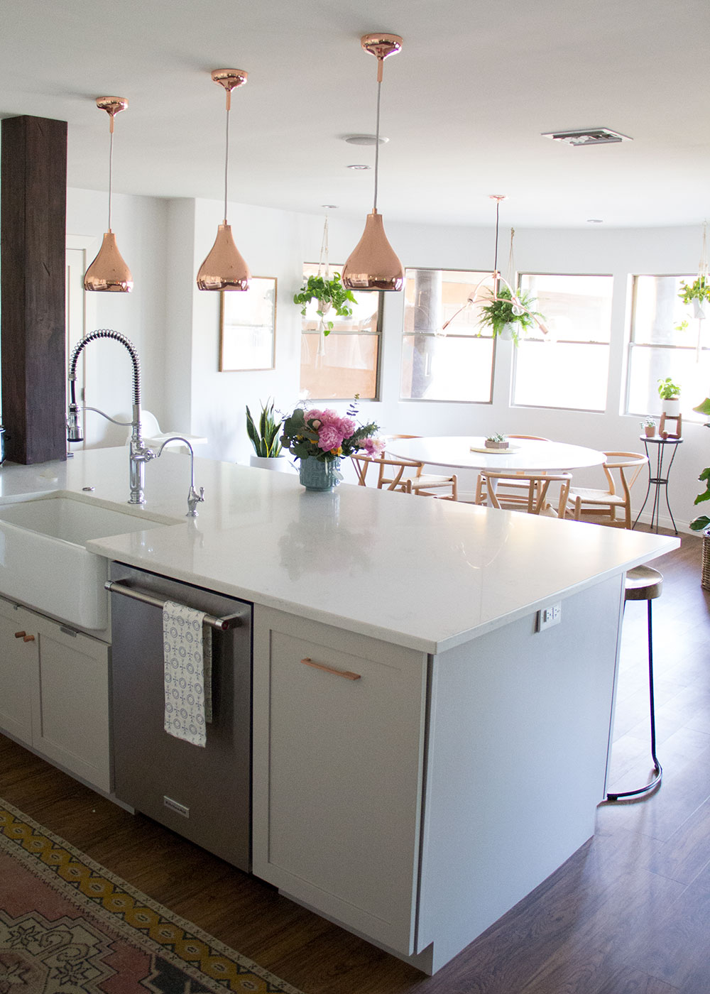 modern white kitchen with a boho vibe island | thelovedesignedlife.com