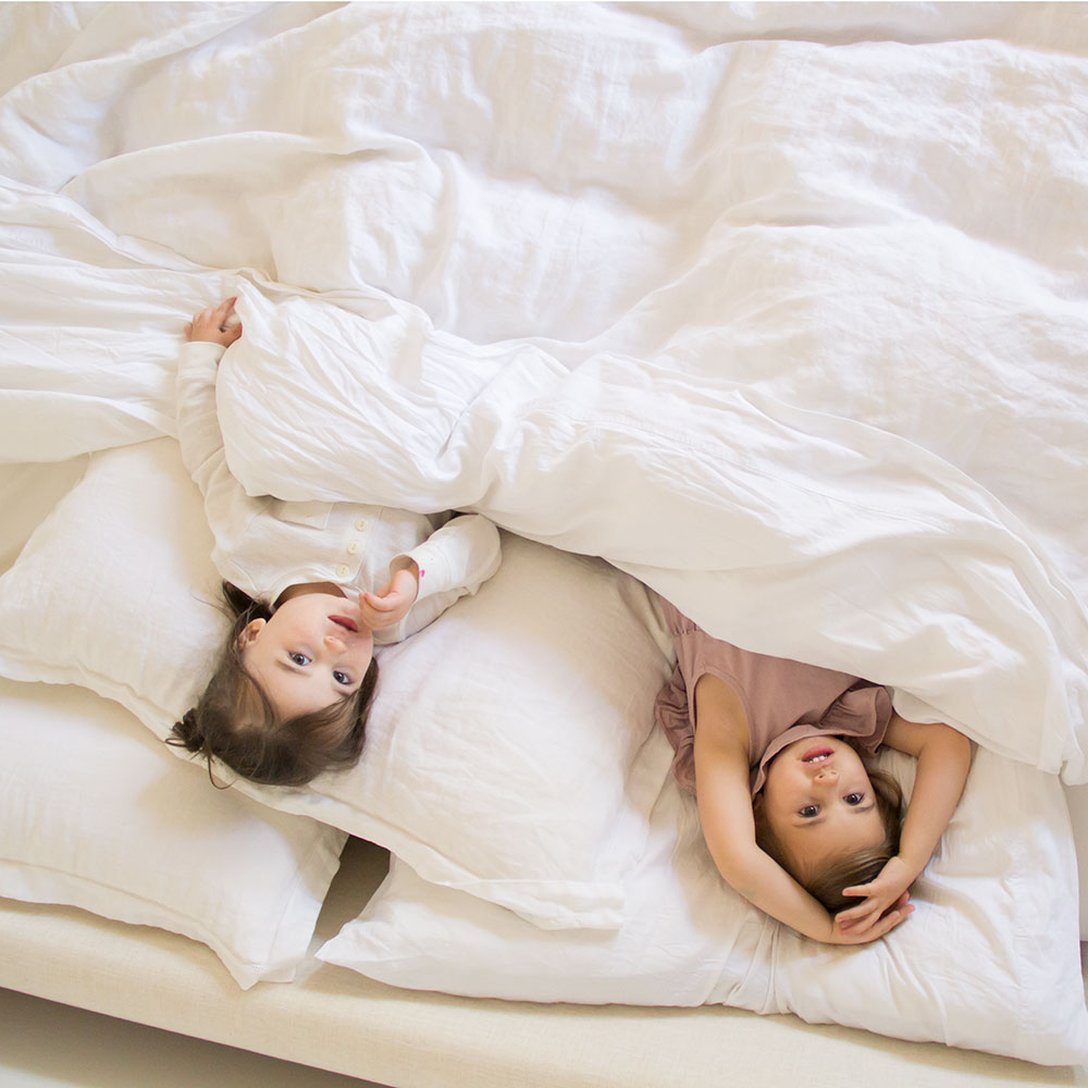 these two testing out the softest sustainable bedding from the company store | thelovedesignedlife.com