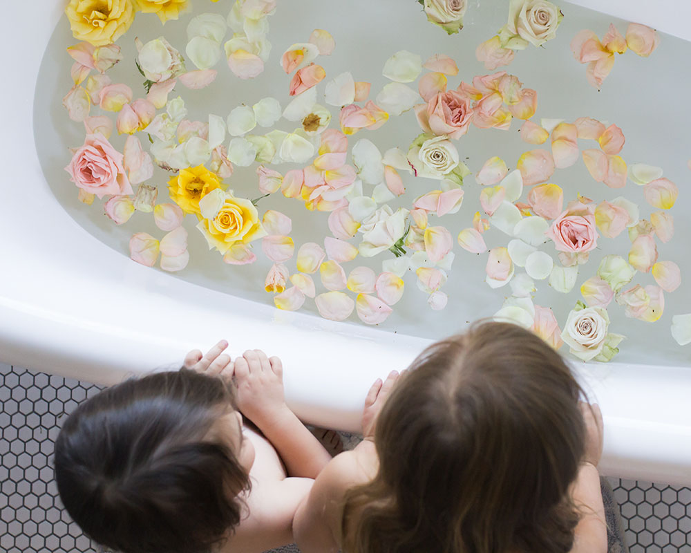 prepping a flower bath for my little ones at bedtime | thelovedesignedlife.com #bathtime #flowerbath #bedtimeroutine