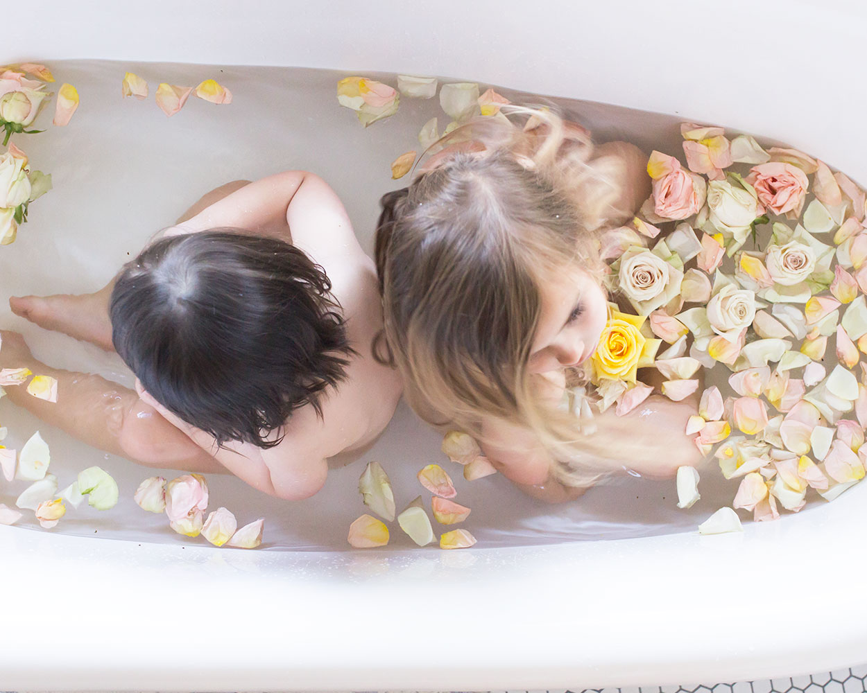 love these two in my bathtub, especially when flowers are involved! | thelovedesignedife.com #bathtime #flowers #flowerbath 