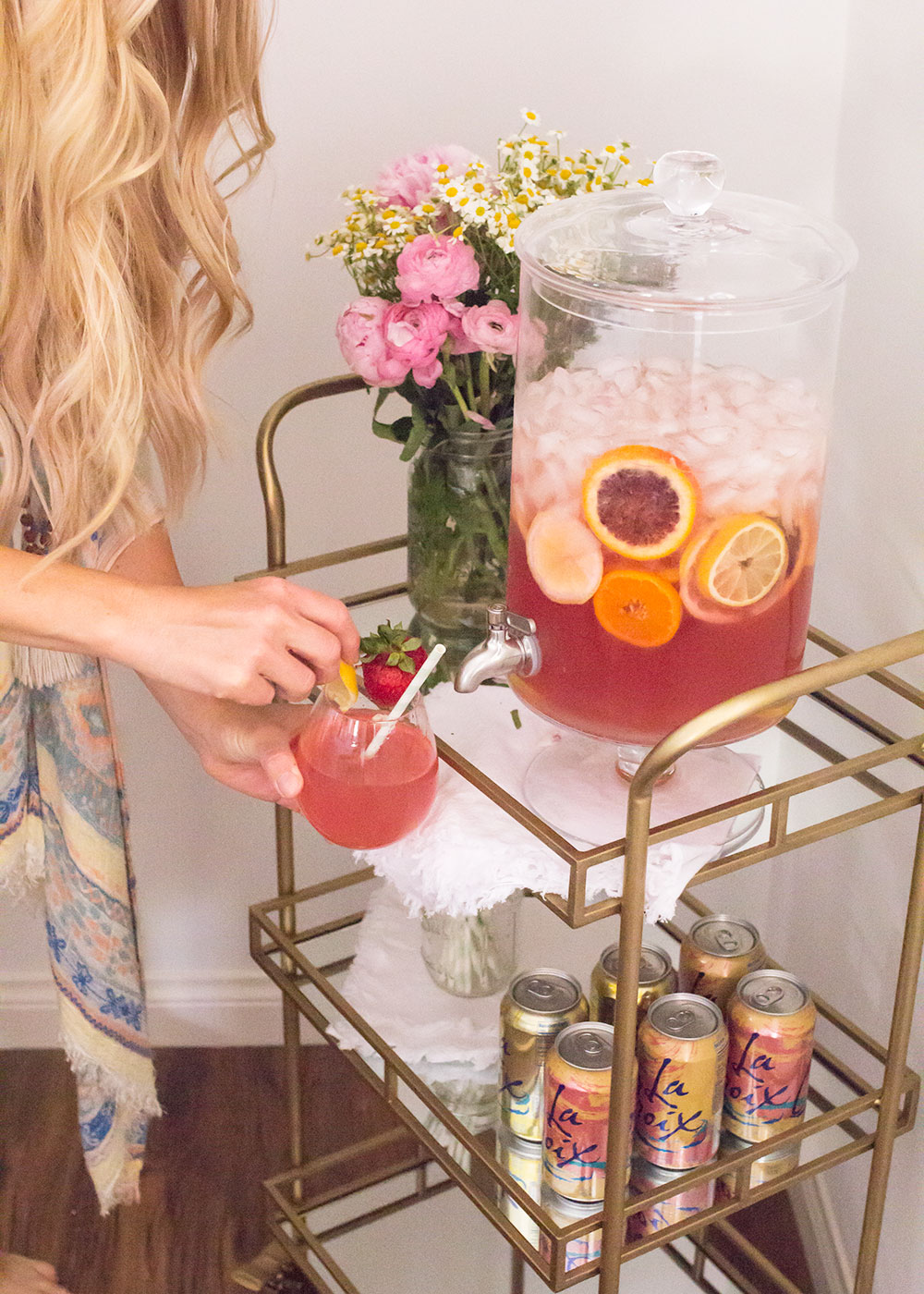 love this glass beverage dispenser that I made my own pink sangria in for a mother's day celebration luncheon | thelovedesignedlife.com #mothersday #bedbathandbeyond #oliviaandoliver