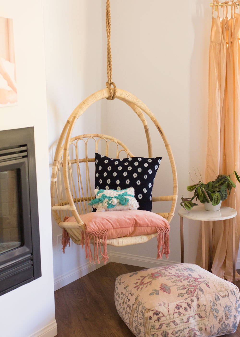 love this hanging chair in this pretty bedroom! | thelovedesignedlife.com #bohovibes #masterbedroom