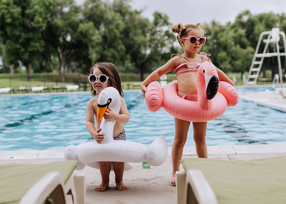 these two are ready for the pool with Blue Lizard Australian Sunscreen and their cute summer floaties | thelovedesingedlife.com #summertime #naturalsunscreen #bluelizardaustraliansunscreen