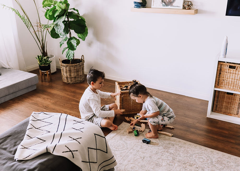 boys helping pick up their toys to keep our home pristine with zevo | thelovedesignedlife.com #habitandhome #bugspray #healthyhome