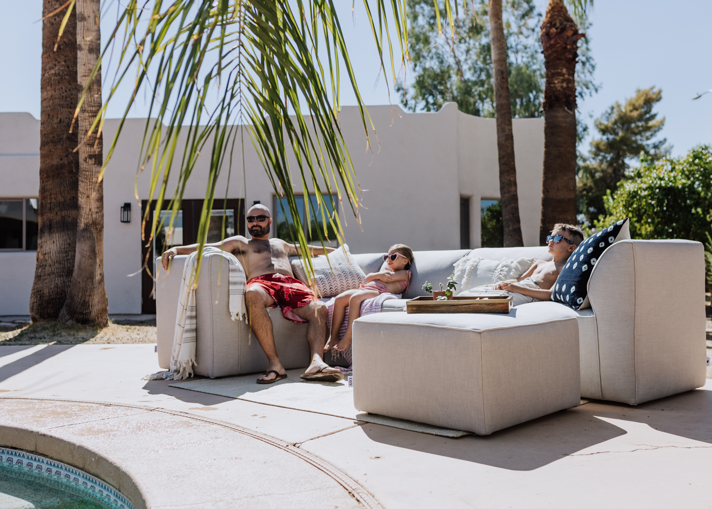 my favorite people enjoying our backyard in the late summer heat | thelovedesignedlife.com #summer #poolside #arizona