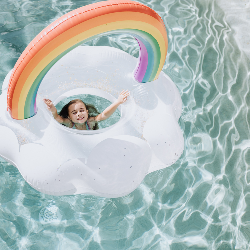 late summer swimming in our backyard | thelovedesignedlife.com #summer #rainbow #poolfloat