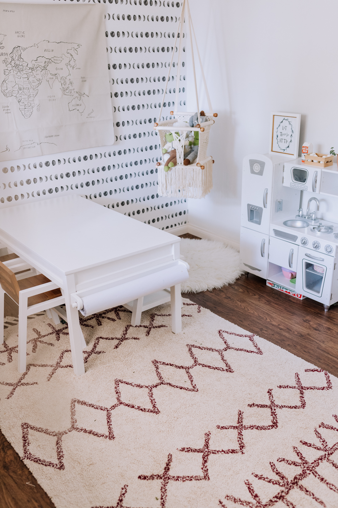 darling modern playroom in a small space | thelovedesignedlife.com #playroom #macrame #playkitchen