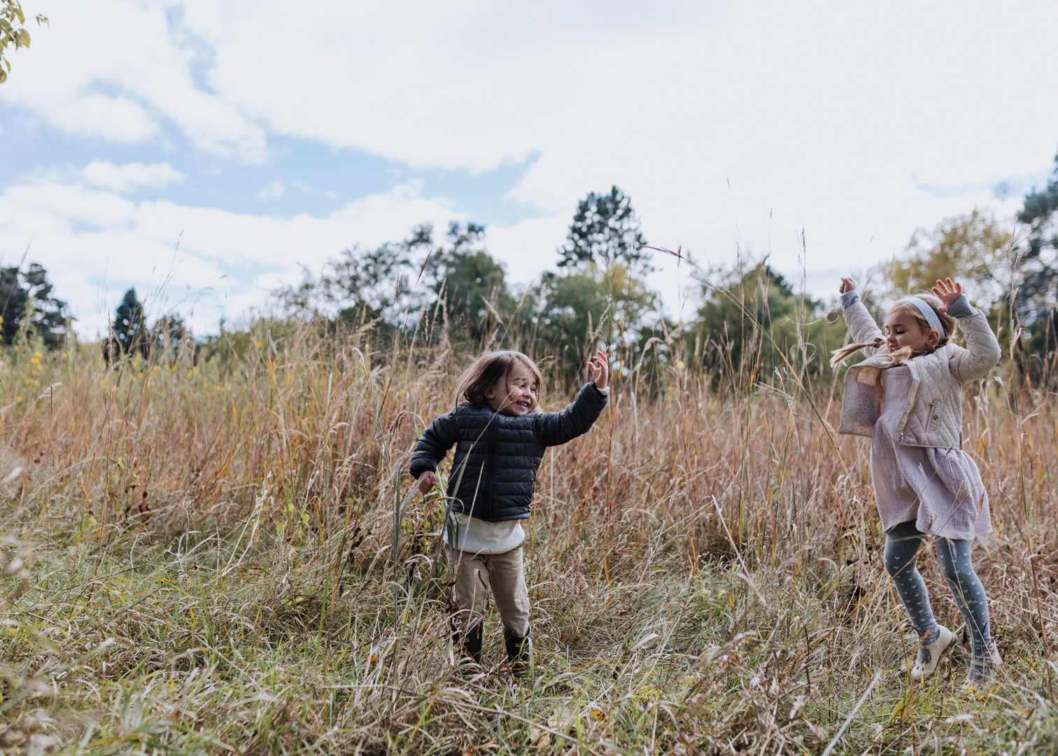 jumping in the wheat | thelovedesignelife.com #fall #wheatfiled #childhood