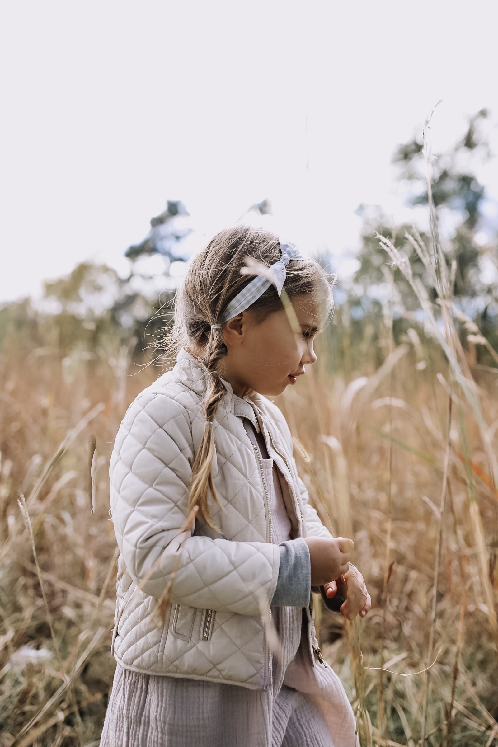 open wheat field in south dakota | thelovedesignedlife.com #southdakota #seasonsofsodak #familytravel #girlshair