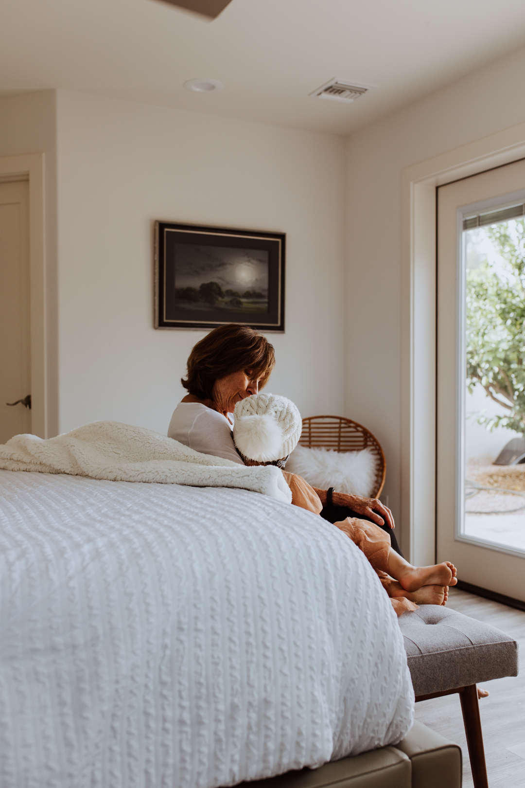 nana and my daughter getting cozy in our guest room | thelovedesignedlife.com #cozy #winterbedding #guestroomupdate #homedecor