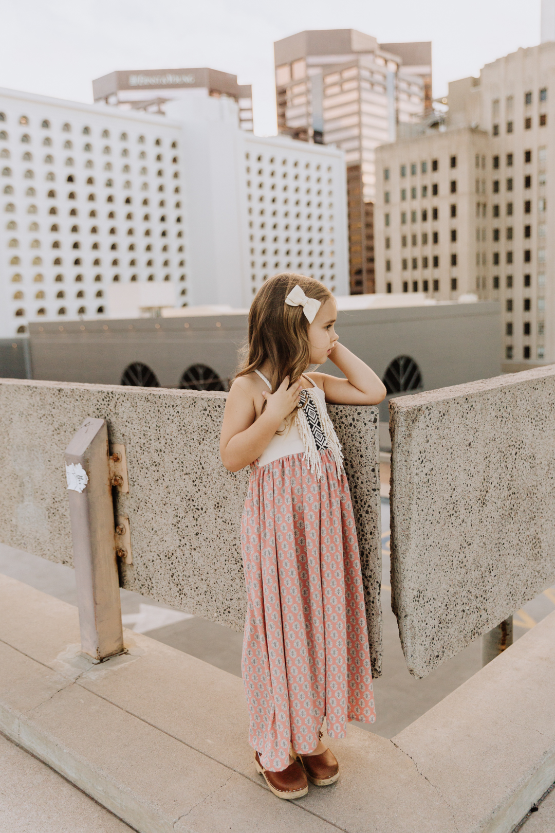 our sweet girl on a rooftop for family photos | thelovedesignedlife.com #ministyle #familyphotos