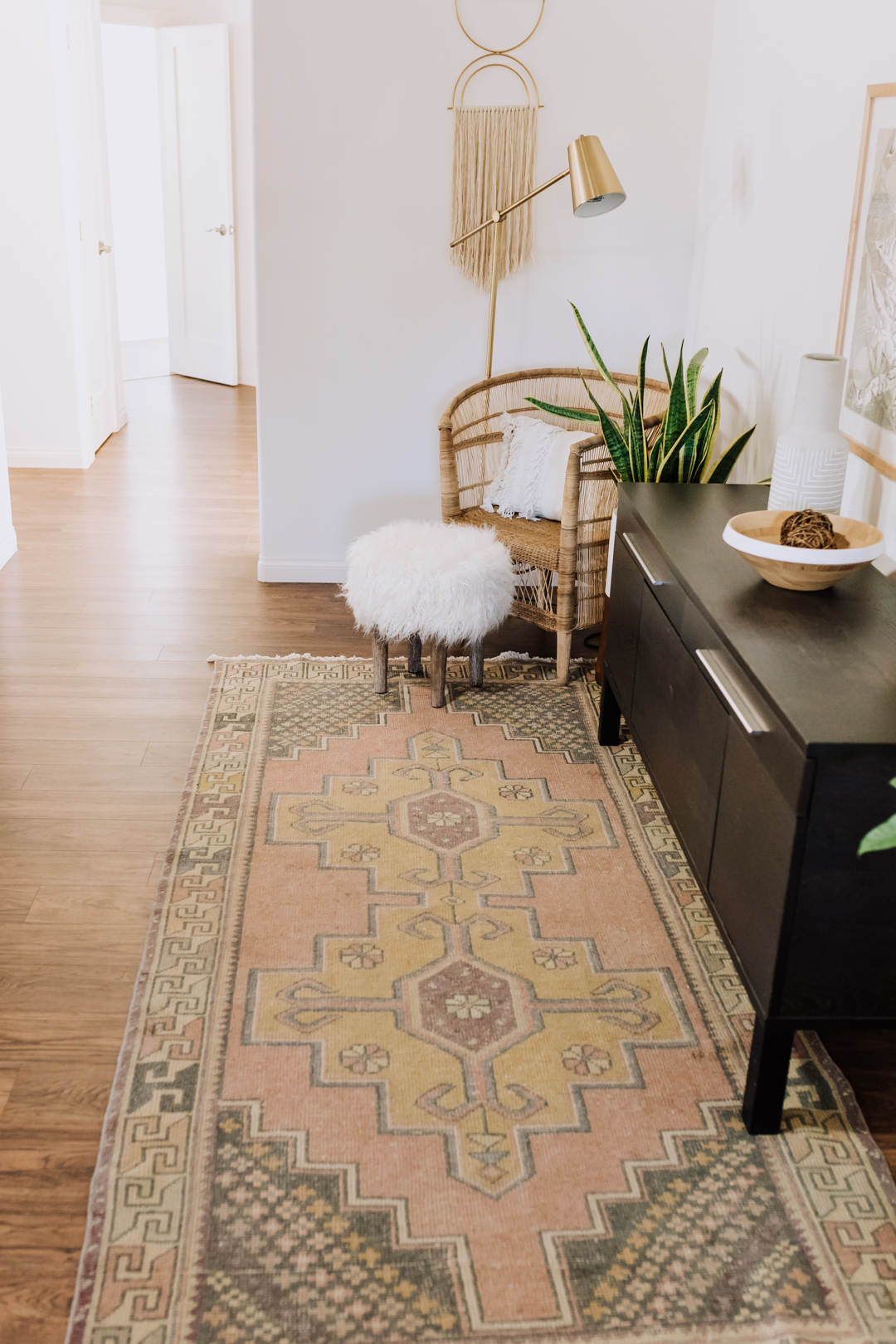 touches of rattan and wicker in our home. #theldlhome #livingroom #bohomodern #interiordesign