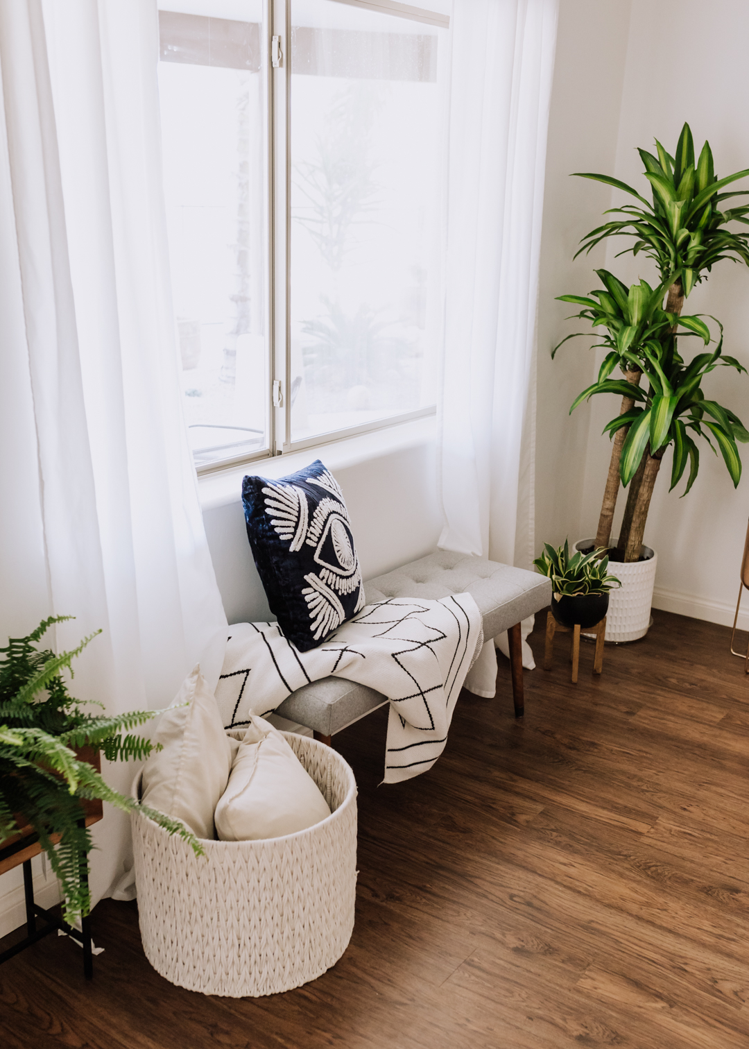 sweet corner under the window in this living room reveal | thelovedesignedlife.com #homedesign #prettyinteriorspaces #livingroomdecor