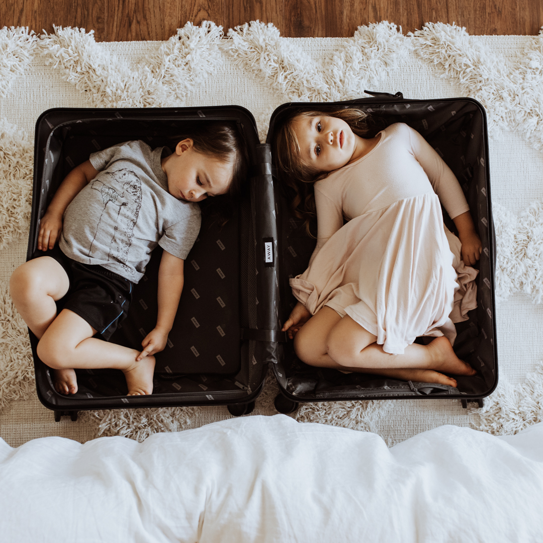 planning to travel more with these kiddos in the new year! | thelovedesignedilife.com #newyears #travel #travelaway #suitcase #travelwithkids
