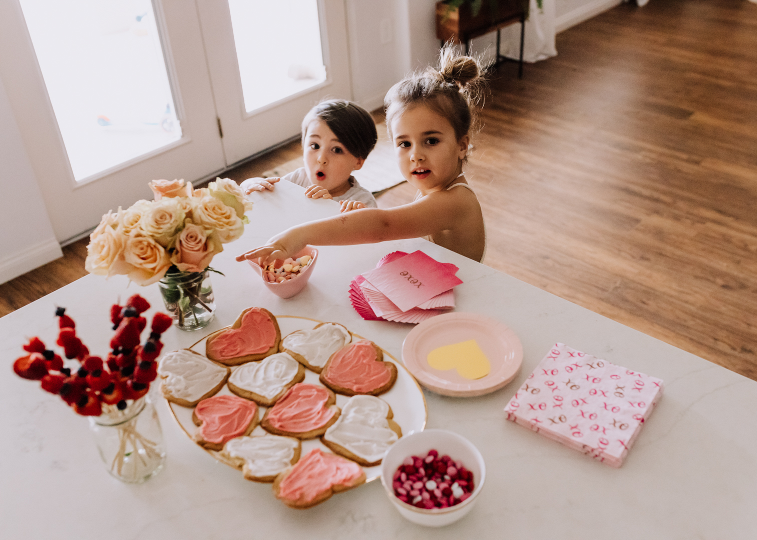 these two are just here for the valentine's heart shaped treats | thelovedesignedlife.com #valentinesday #party 