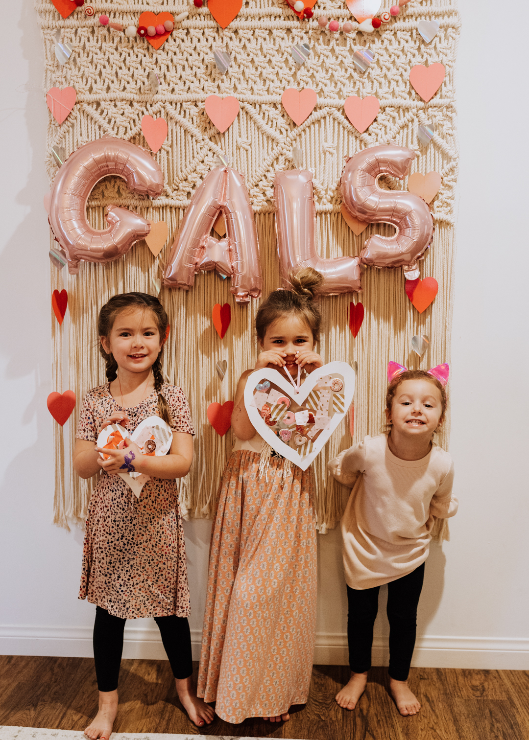 gals with their finished suncatcher heart | thelovedesignedlife.com #heartcraft #suncatcher #galentines