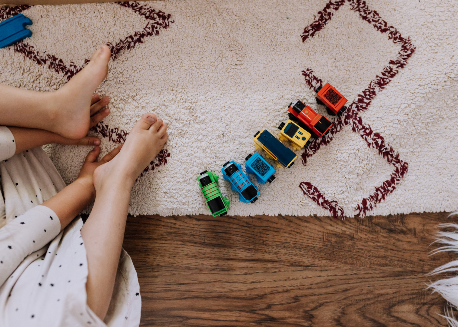 a rainbow of Thomas and Friends Tracks and Engines, ready for play! | thelovedesignelife.com #thomasandfriends #woodentoys #diytraintable