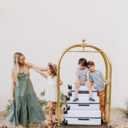 summer travel ready with suitcases and a hotel bellhop