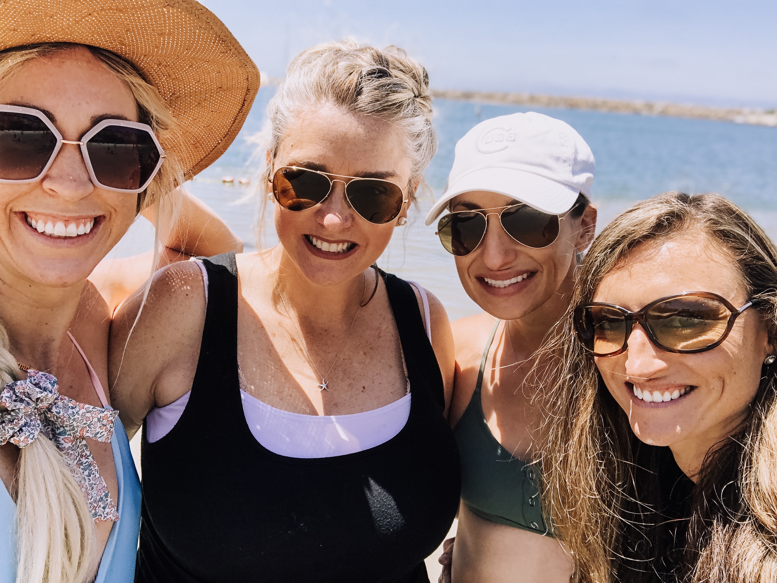 four best friends at the beach